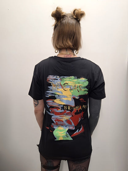 THE CURE – Band T-Shirt: Between - COOCOO.at - Dein Merch Shop aus Österreich